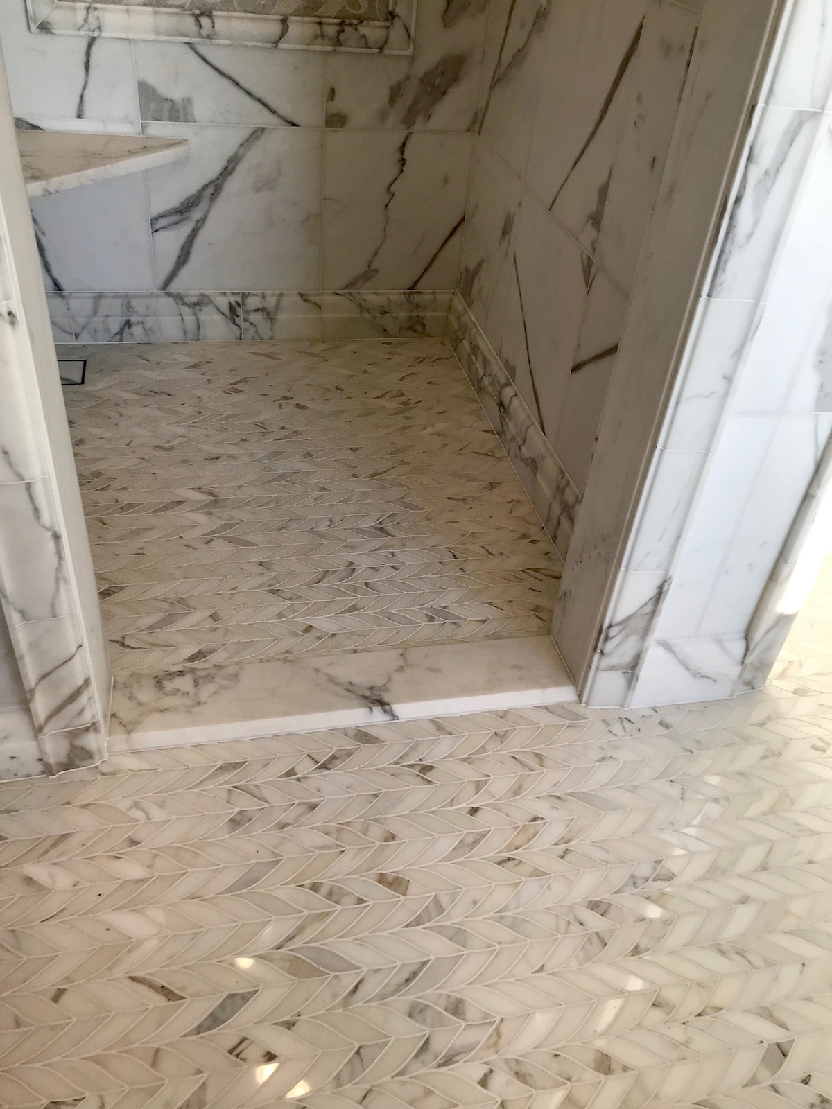 Marble mosiac bath and shower floor