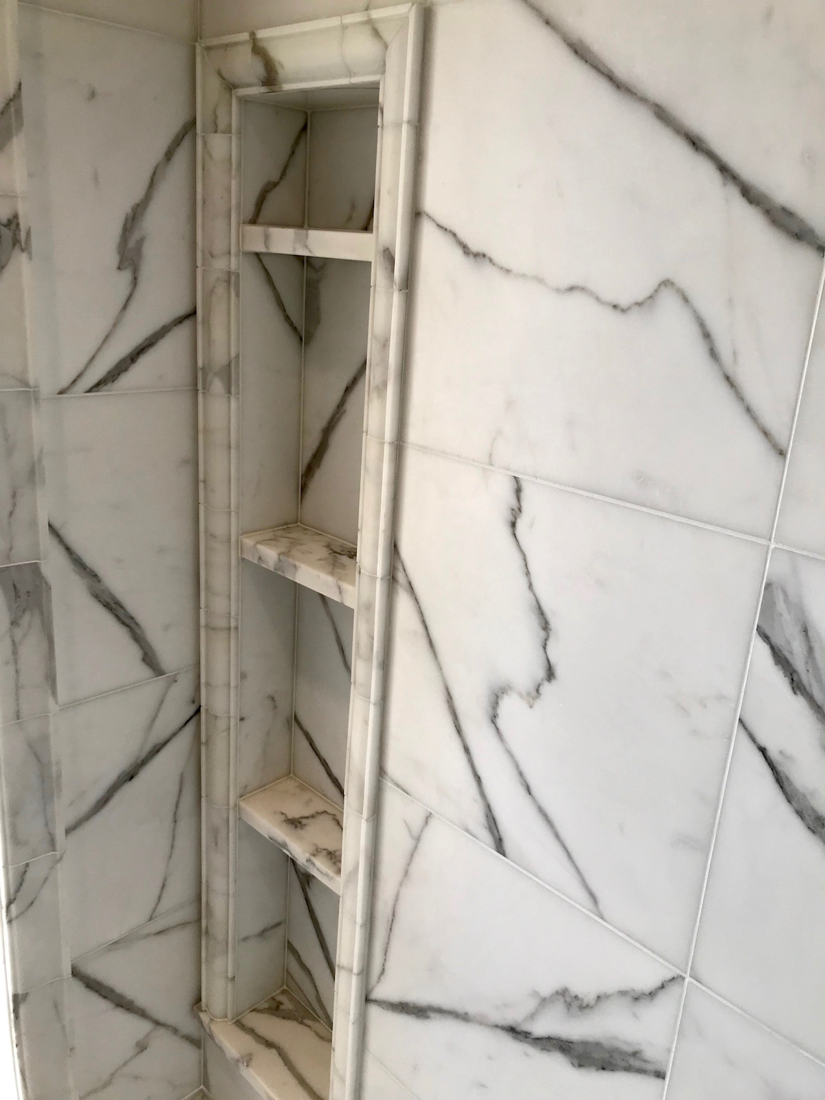 Custom marble shower niche