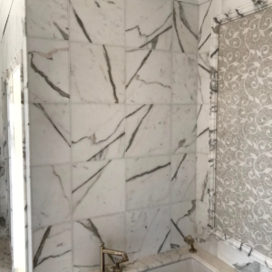 Calacatta marble bath, Ann Sacks tile