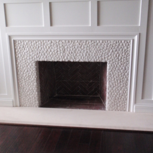 white pebble rock fireplace