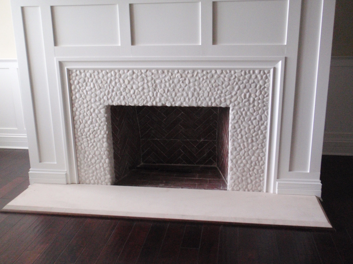 white pebble rock fireplace