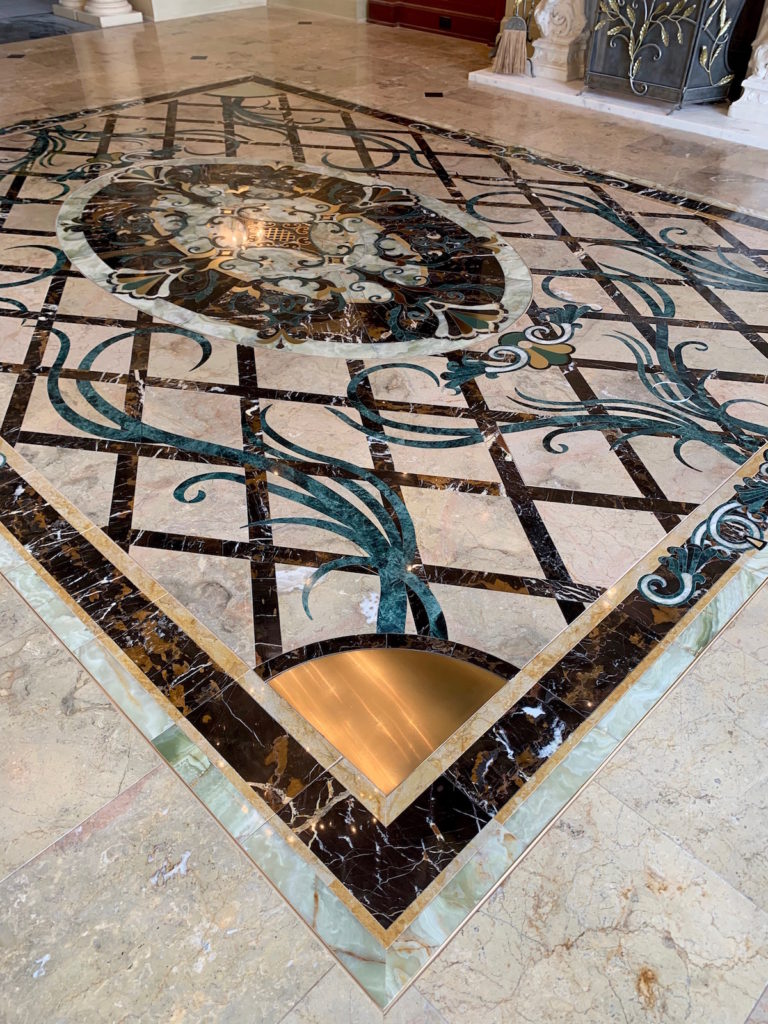 custom foyer medallion with brass inlays